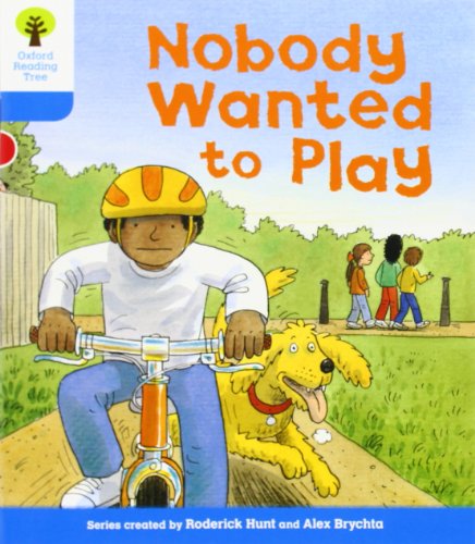 A child in a yellow helmet rides a bike with a dog running alongside.