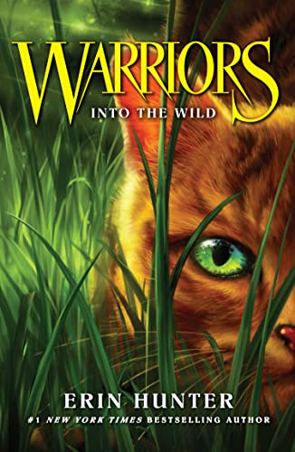 Book cover: cat’s face in tall grass, “Warriors” title in gold.