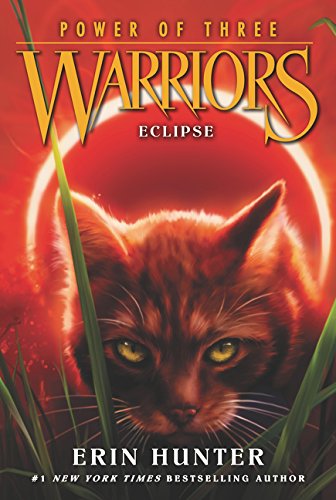 A ginger cat peers from grass in front of a glowing red eclipse.