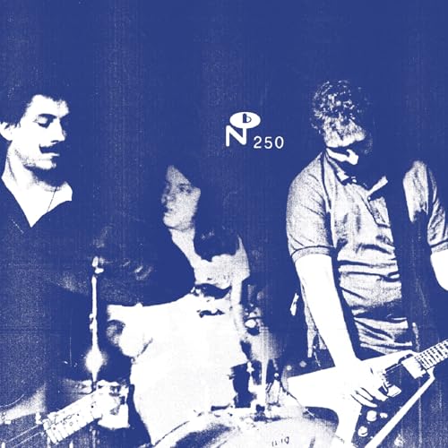 Husker Du band portrait from album cover, grainy blue-toned image.