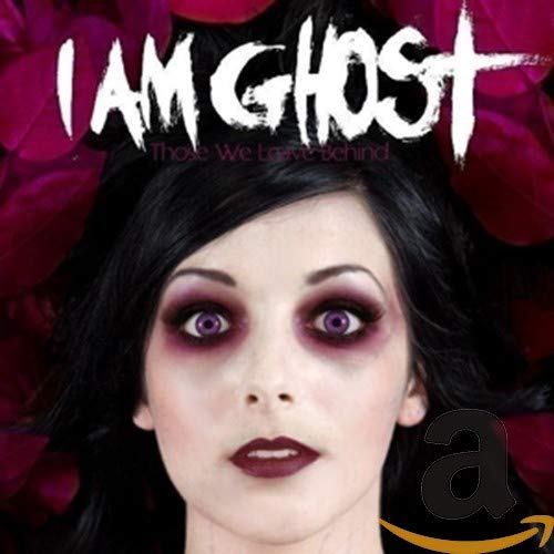 CD cover: woman with pale skin, dark makeup, and intense purple eyes.