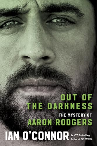 Close-up book cover featuring Aaron Rodgers, with title "Out of the Darkness.