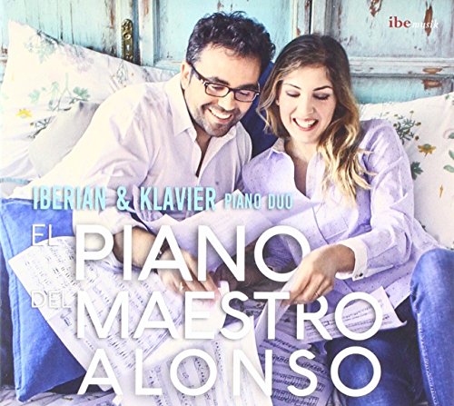 A man and woman smiling while looking at sheet music together.