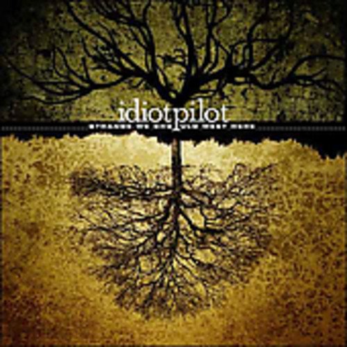CD cover: tree with exposed roots on a textured gold background.