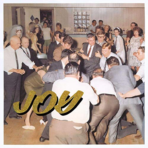 Vintage photo of people dancing, with gold text reading "JOY" overlaid.