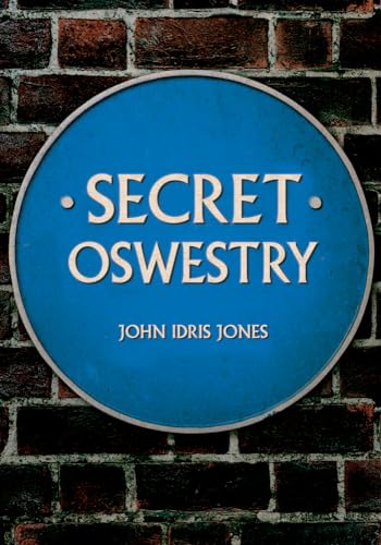 Blue circular plaque reading "Secret Oswestry" against a brick wall.