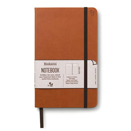 Brown notebook with black elastic band and a white label.