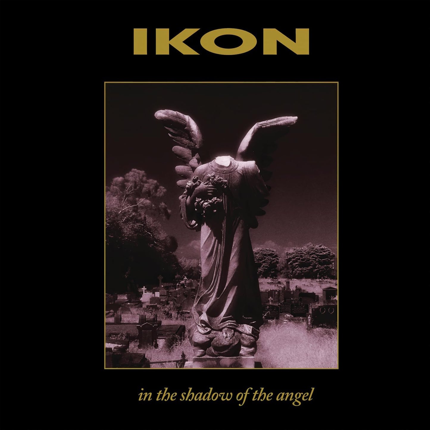 Angel statue in a graveyard, album cover for Ikon's "In The Shadow Of The Angel.