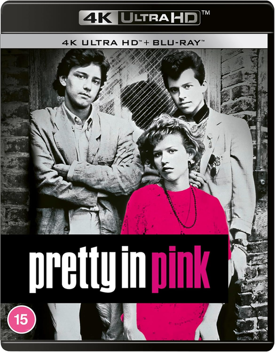 Blu-ray case for the 1986 film *Pretty in Pink*, pink and white cover art.