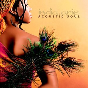 India.Arie album cover featuring a woman with peacock feathers.