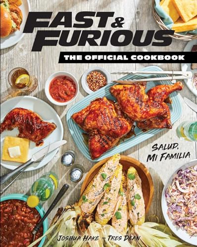 Cookbook cover featuring a spread of roasted chicken, corn, and sides on a table.