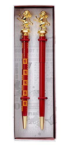 Two red Gryffindor pens with gold lion toppers in a rectangular display box.