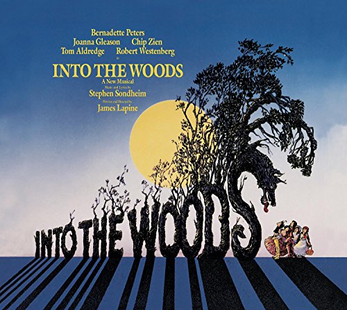 CD cover for “Into The Woods” musical with trees and a wolf.