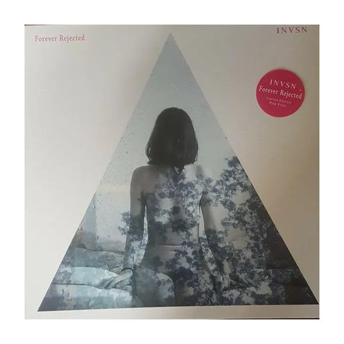 Pink vinyl record cover with a triangular design and a woman’s back.