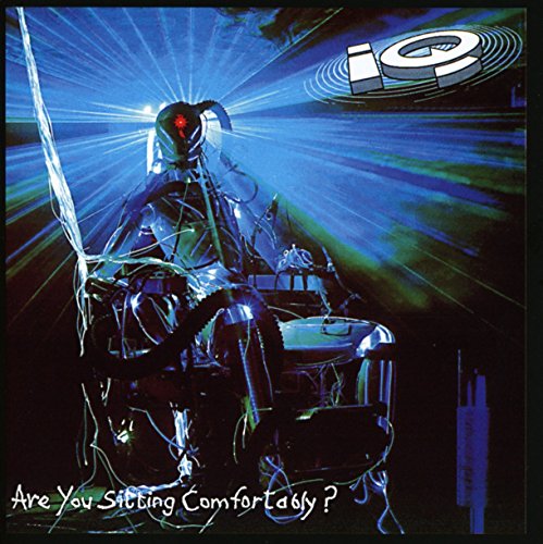 CD cover: robotic figure on a complex chair, blue and black tones.