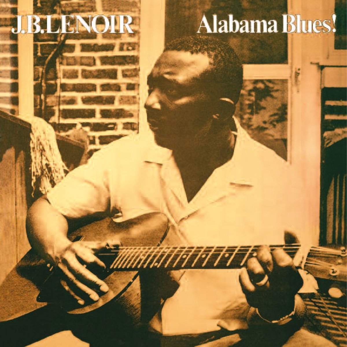 J.B. Lenoir album cover: sepia-toned portrait of a man with a guitar.