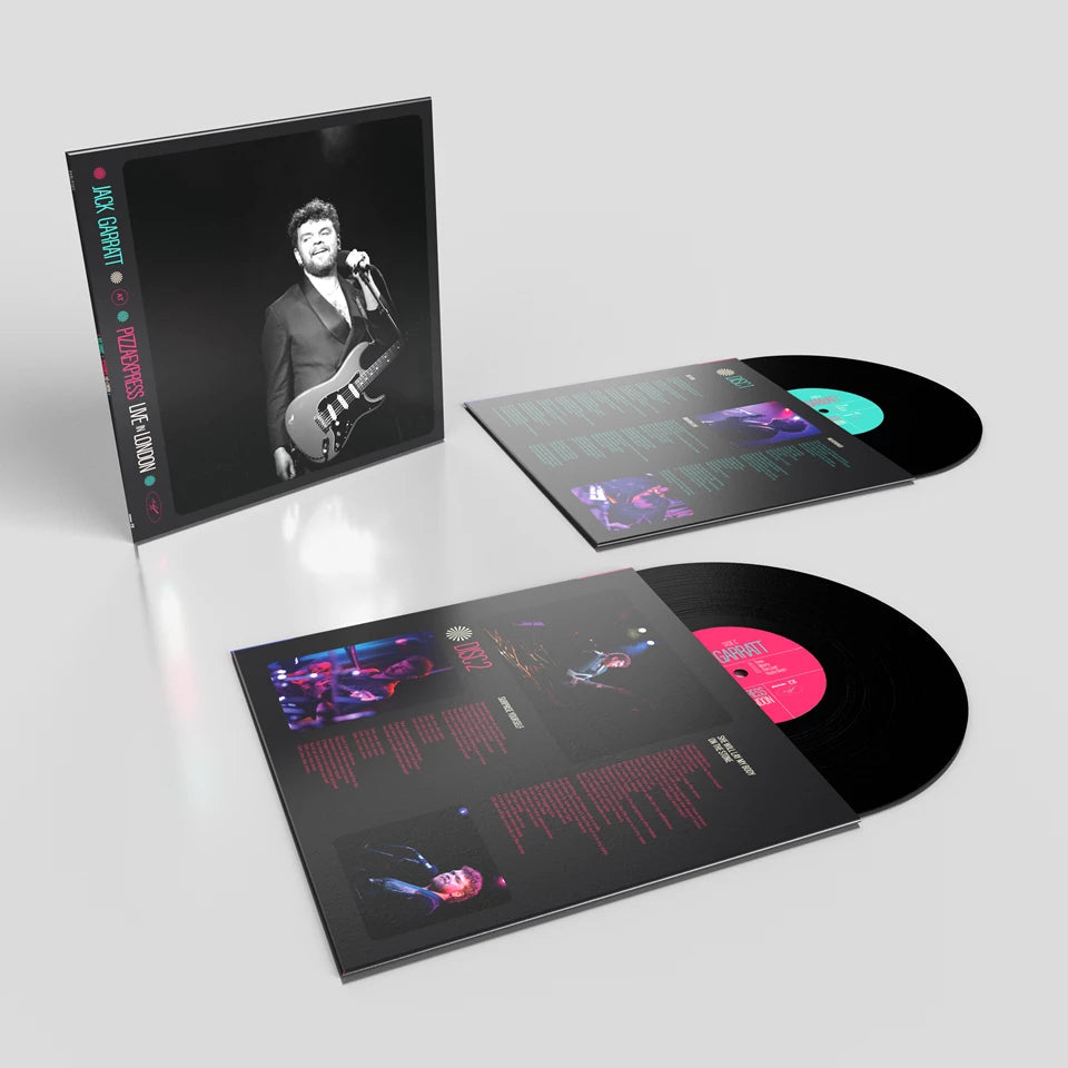 Jack Garratt vinyl record, open case, and two discs displayed on white.