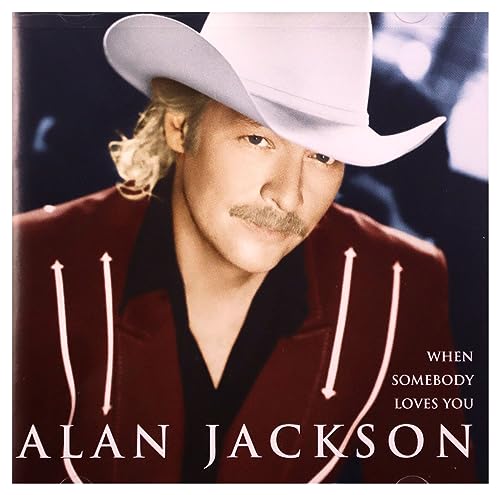 Alan Jackson in a white cowboy hat, album cover for “When Somebody Loves You.”