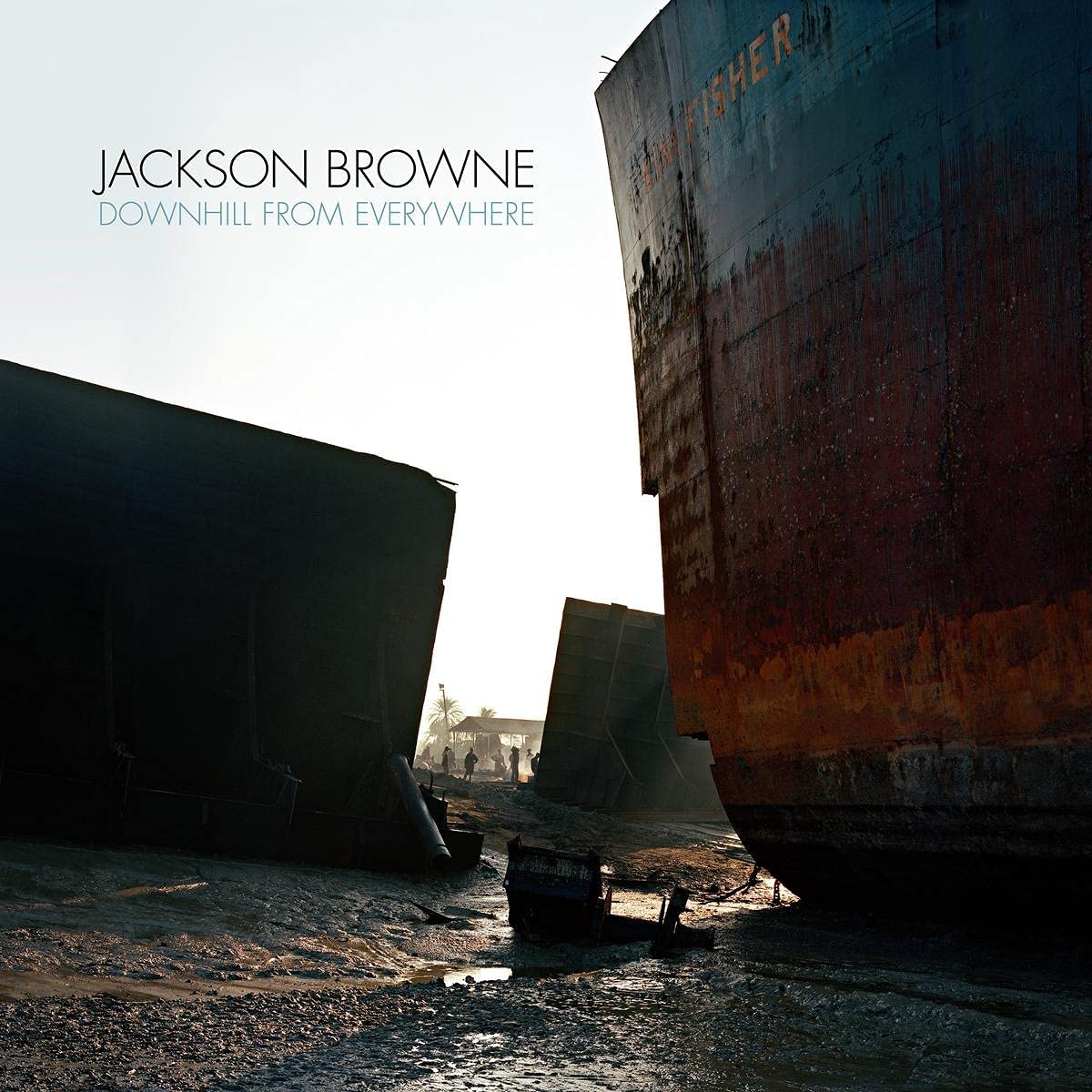 Album cover for Jackson Browneās āDownhill From Everywhereā featuring ship hulls.