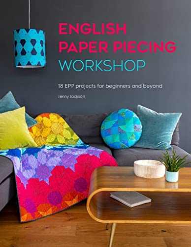 Book cover featuring a colorful quilted blanket and pillows on a gray sofa.