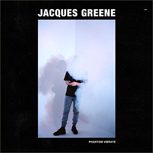 Vinyl cover featuring a person in a white room obscured by blue smoke.