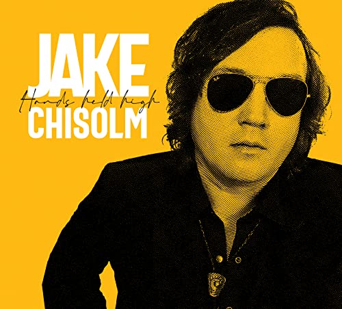 Yellow halftone portrait of Jake Chisholm wearing sunglasses.