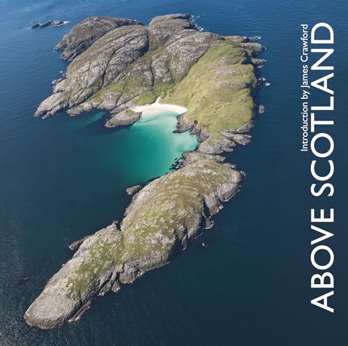 Aerial view of a rocky Scottish island with a small beach.