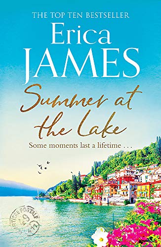 Book cover: lakeside village with colorful buildings under a blue sky.