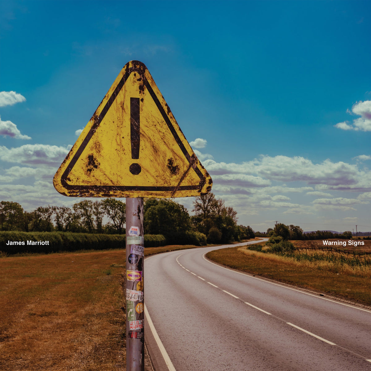 CD cover featuring a weathered yellow warning sign against a sky.