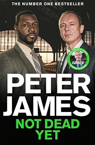 Book cover featuring two men in suits with a train station backdrop.