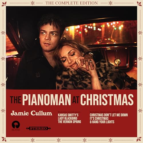 Jamie Cullum album cover featuring him and a woman in a car, snowflakes.