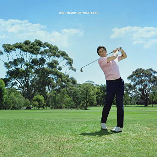 Album cover: man golfing on a green course under a blue sky.