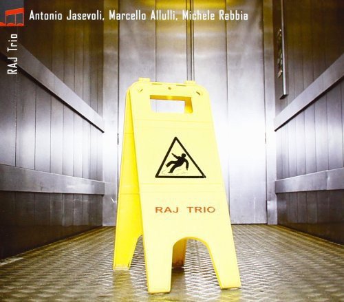 CD cover with a yellow "wet floor" sign in a hallway.