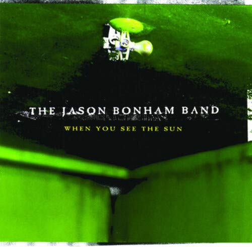 CD cover for Jason Bonham Band’s “When You See the Sun”, green background.