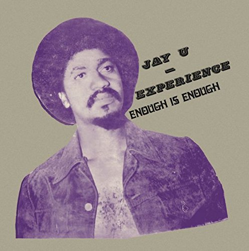 Vinyl album cover with a purple-toned man wearing a denim jacket and afro.