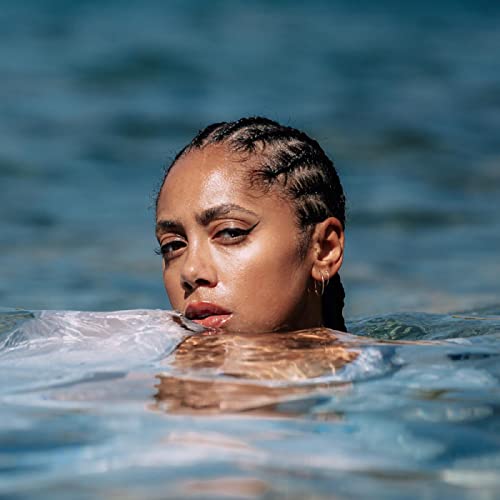 Jayda G album cover: woman’s face partially submerged in water.