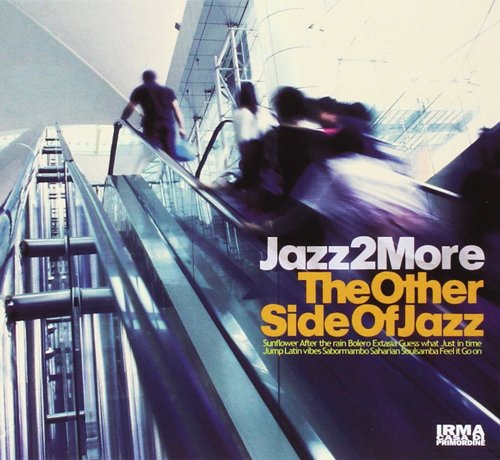 CD cover with blurred figures on an escalator and bold text.