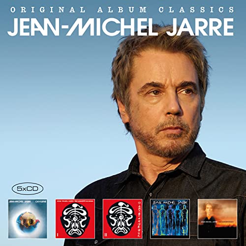 Jean-Michel Jarre portrait against a blue sky with five album covers at the bottom.