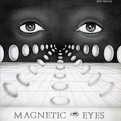 Vinyl record cover: large, stylized eyes and floating pills in grayscale.