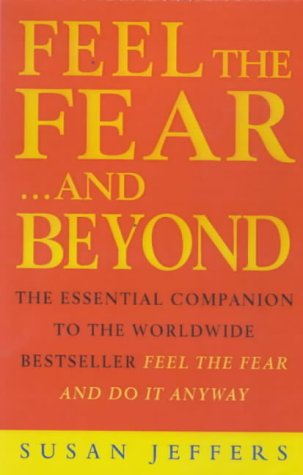 Book cover with orange background and bold yellow title: "Feel the Fear...and Beyond.