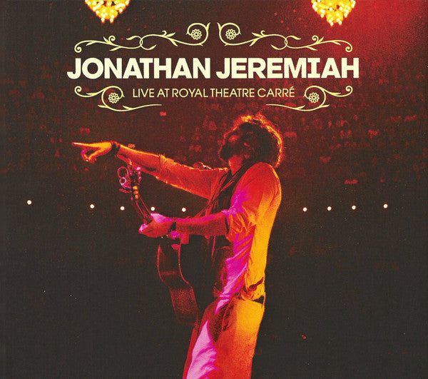 Jonathan Jeremiah performing live on stage with a guitar, CD cover.