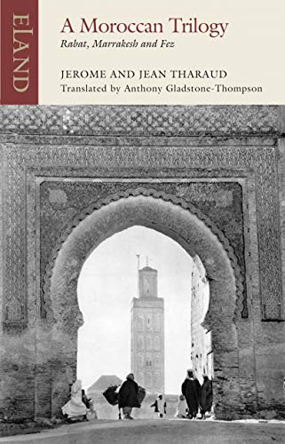 Book cover with an ornate archway framing a distant minaret and figures.