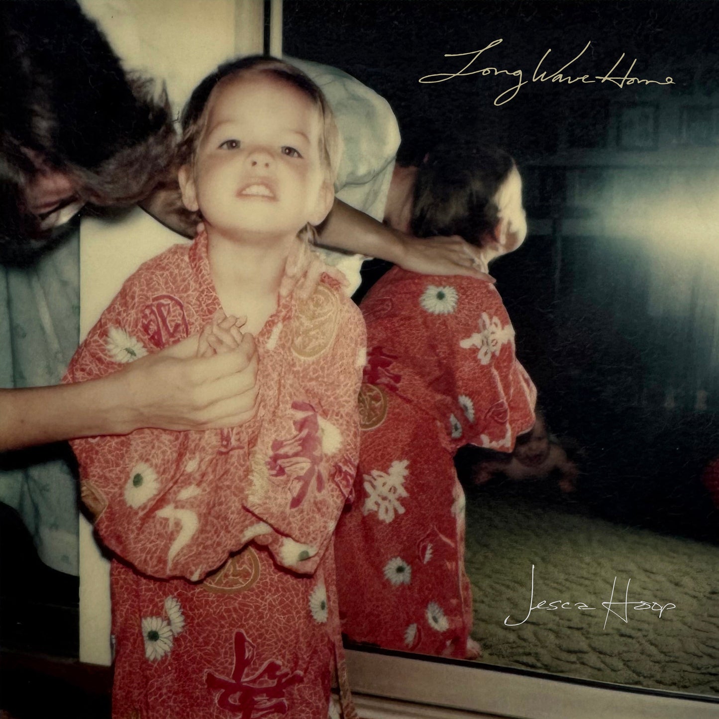 CD cover: vintage photo of a young girl in a floral dress.