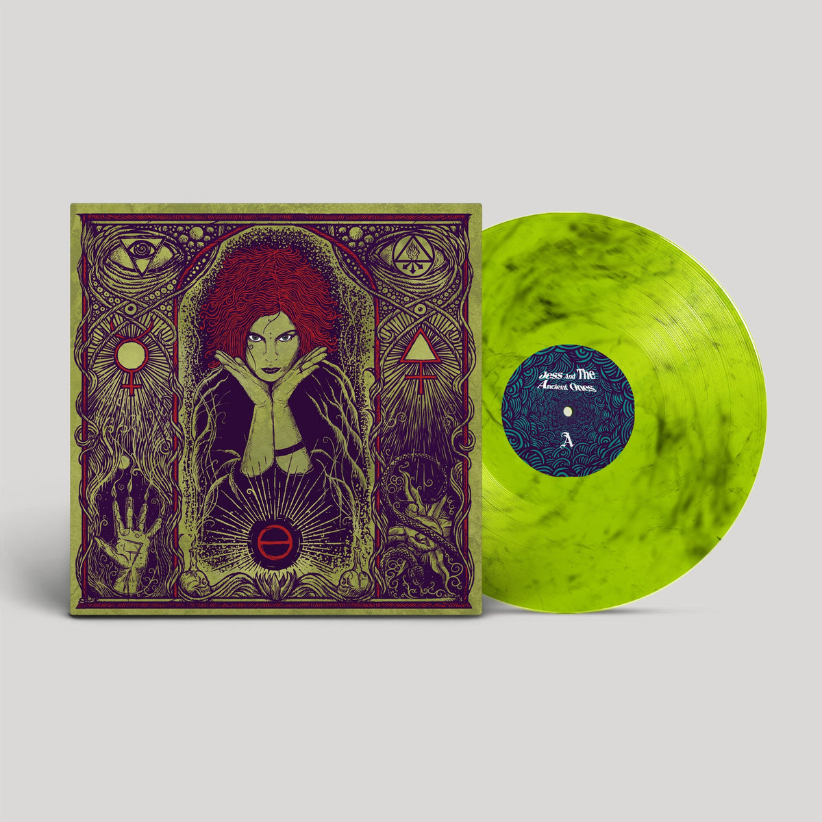 Vinyl record with ornate cover art featuring a woman and mystical symbols.