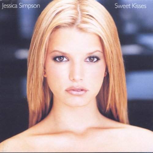 Jessica Simpson’s “Sweet Kisses” CD cover featuring a close-up portrait.