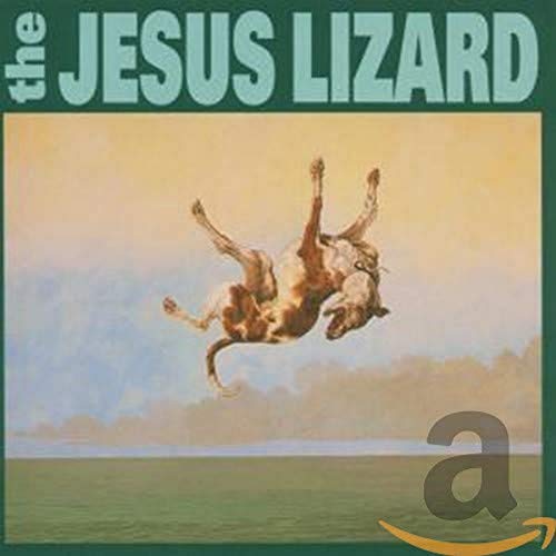 Album cover art showing a dog leaping against a landscape with text above.