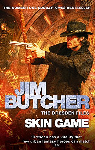 Book cover: man in hat holding gun, fiery card background.