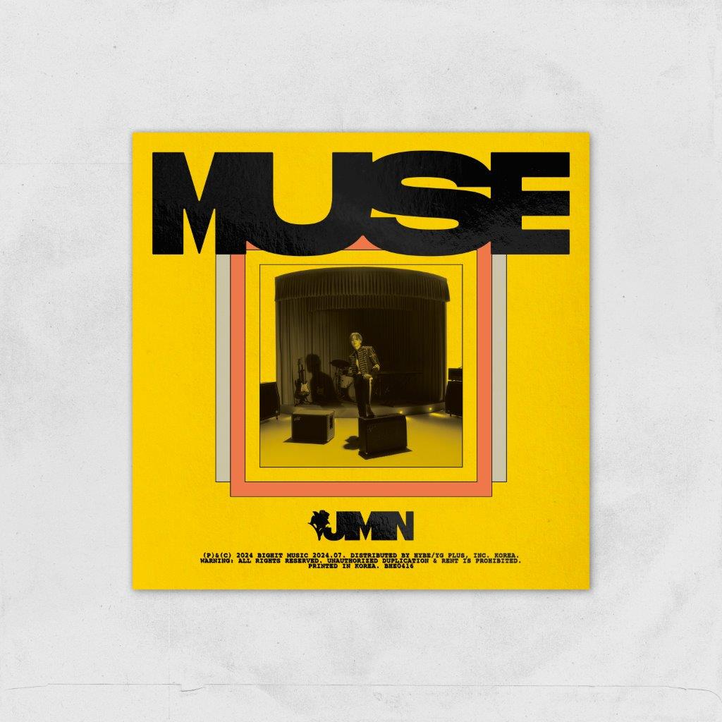 Yellow CD cover with a stage scene and bold "MUSE" text.