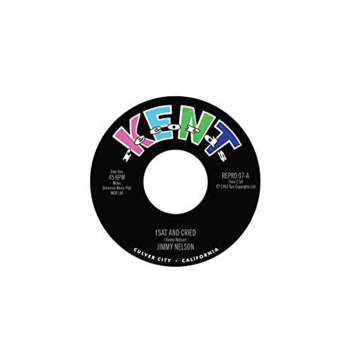 Black and white vinyl record label with colorful "KENT" logo and song titles.