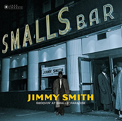 CD cover for Jimmy Smith’s “Groovin’ At Smalls Paradise” with a nighttime club scene.